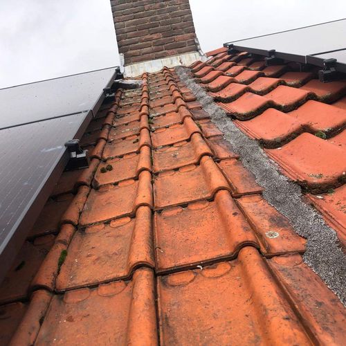 Hellend dak Heteren met oude dakpannen